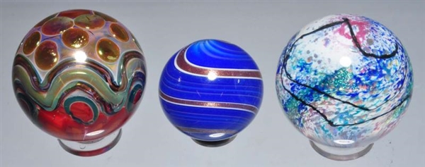 LOT OF 3: DEVI, HOWARD & MURRAY MARBLES.          