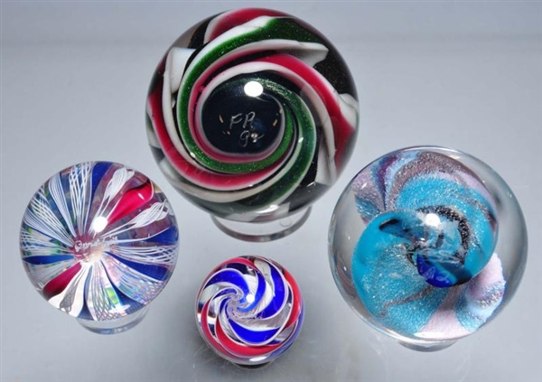 LOT OF 4: MARBLES.                                