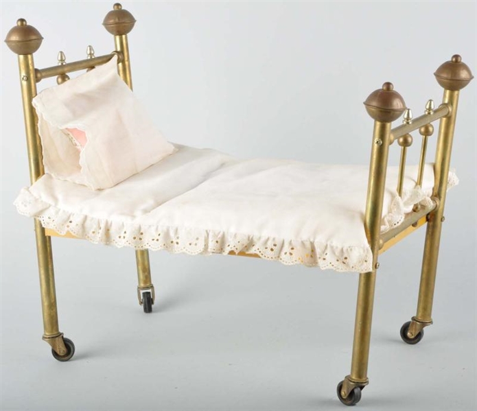 LOT OF 2: DOLL BRASS BEDS.                        