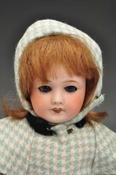 BLEUETTE DOLL WITH SIX CLOTHING PIECES.           