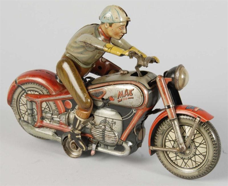 TIN LITHO ARNOLD MAC MOTORCYCLIST WIND-UP TOY.    