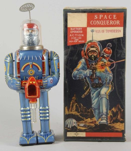 TIN SPACE CONQUEROR ASTRONAUT BATTERY-OP TOY.     
