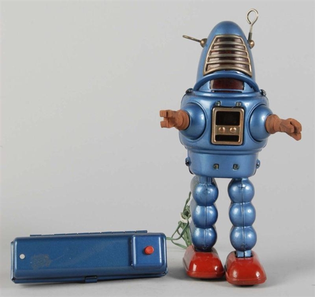 TIN LITHO PLANET ROBOT BATTERY-OPERATED TOY.      