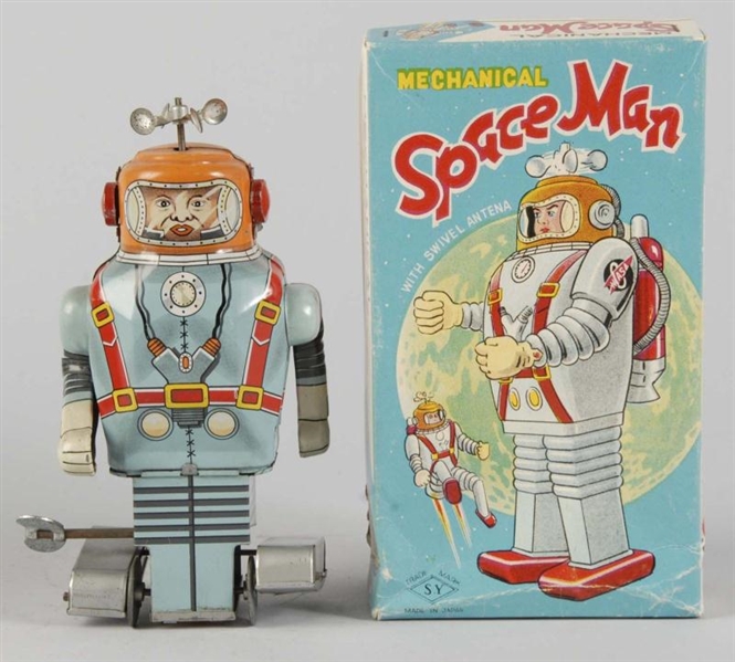 TIN LITHO SPACE MAN WIND-UP TOY.                  