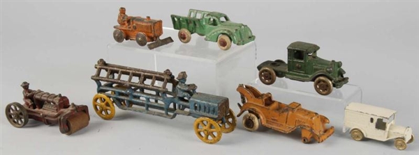 LOT OF 7: CAST IRON & DIECAST VEHICLE TOYS.       