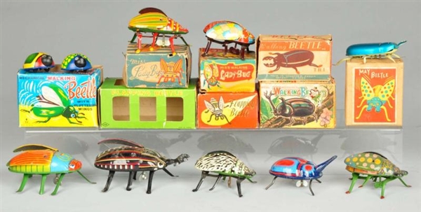 LOT OF 8: BEETLE & LADY BUG WIND-UP TOYS.         