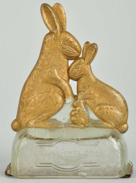 GLASS RABBIT FAMILY CANDY CONTAINER.              