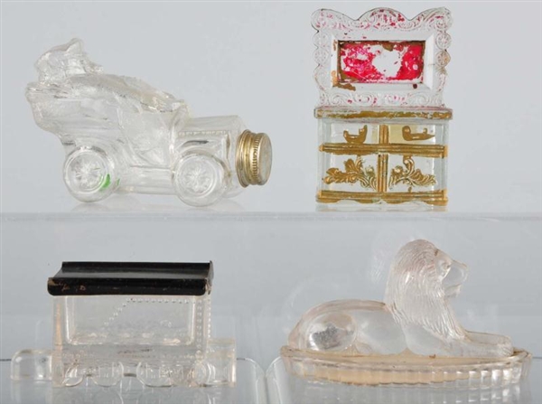 LOT OF 4: GLASS CANDY CONTAINERS.                 