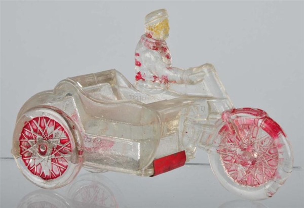 GLASS MAN ON MOTORCYCLE CANDY CONTAINER.          