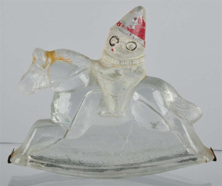 GLASS CLOWN ON ROCKING HORSE CANDY CONTAINER.     