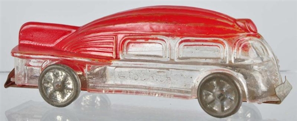 GLASS CAR OF THE FUTURE CANDY CONTAINER.          