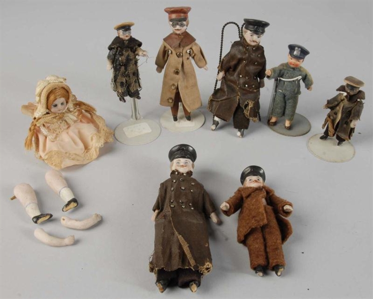 LOT OF 8: BISQUE HEAD CHAUFFER & OTHER FIGURES.   