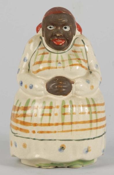 PORCELAIN MAMMY STRING HOLDER.                    