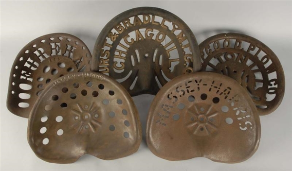 LOT OF 5: CAST IRON & METAL TRACTOR SEATS.        