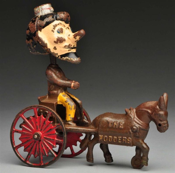 CAST IRON THE NODDERS WAGON HORSE-DRAWN TOY.      