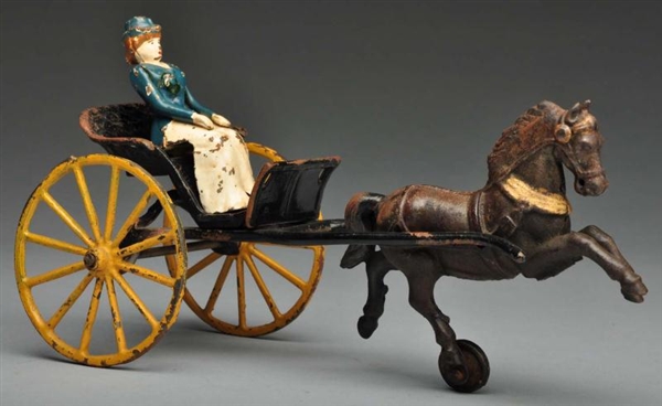 CAST IRON SHIMER ROAD CART HORSE-DRAWN TOY.       