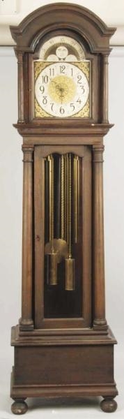 MAHOGANY TALL CASE CLOCK WITH 4 CHIMES.           