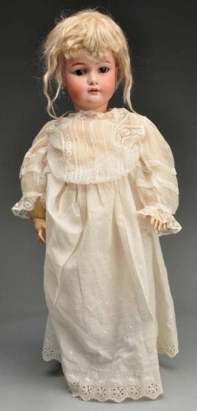 GERMAN BISQUE HEAD DOLL.                          