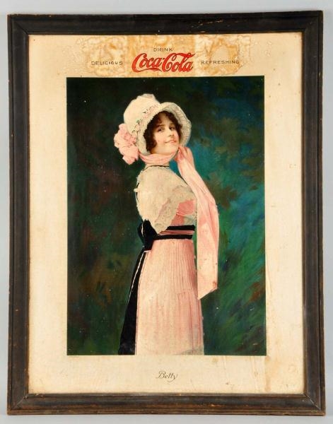 1914 CARDBOARD COCA-COLA BETTY SIGN IN FRAME.     