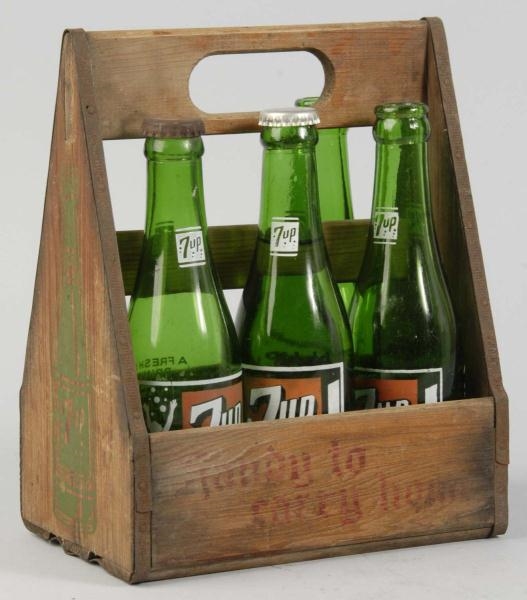 WOODEN 7UP CARRIER WITH BOTTLES.                  
