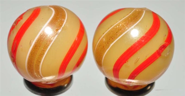 LOT OF 2: BUTTERSCOTCH BANDED LUTZ MARBLES.       