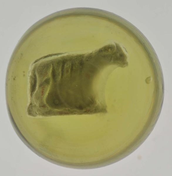 YELLOW GLASS LAMB SULPHIDE MARBLE.                