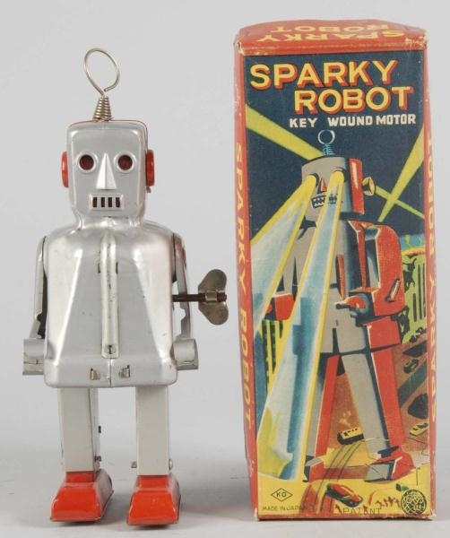 TIN SPARKY ROBOT WIND-UP TOY.                     