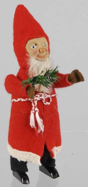 SCHUCO FATHER CHRISTMAS GNOME WIND-UP TOY.        