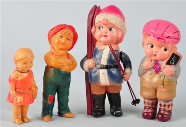 LOT OF 4: CELLULOID PEOPLE FIGURES.               