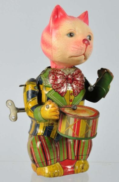 CELLULOID & TIN LITHO CAT DRUMMING WIND-UP TOY.   