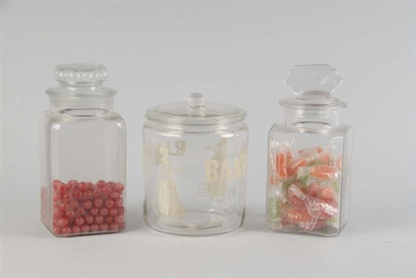 LOT OF 3: ASSORTED STORE JARS.                    