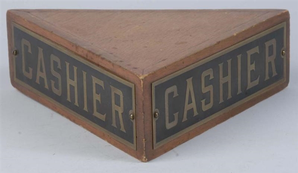 EARLY WOODEN TRIANGULAR CASHIER SIGN.             