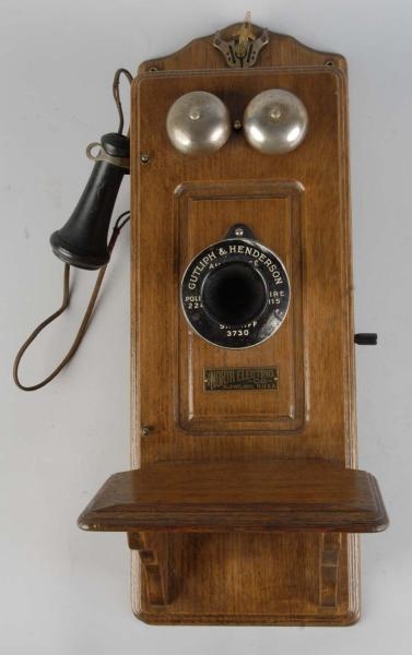 OAK WALL PHONE BY NORTH ELECTRIC COMPANY.         
