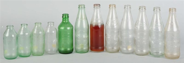 LOT OF 12: GLASS NO-RETURN SODA BOTTLES.          