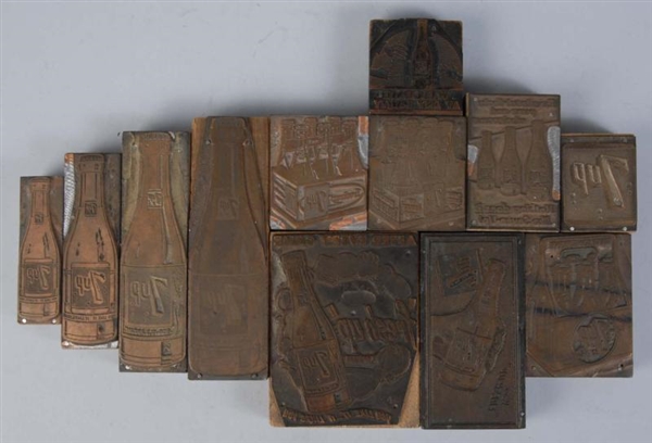 GROUP OF 12 ASSORTED 7UP COPPER PRINTING BLOCKS.  