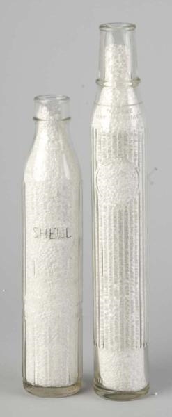 LOT OF 2: VINTAGE SHELL OIL GLASS BOTTLES.        