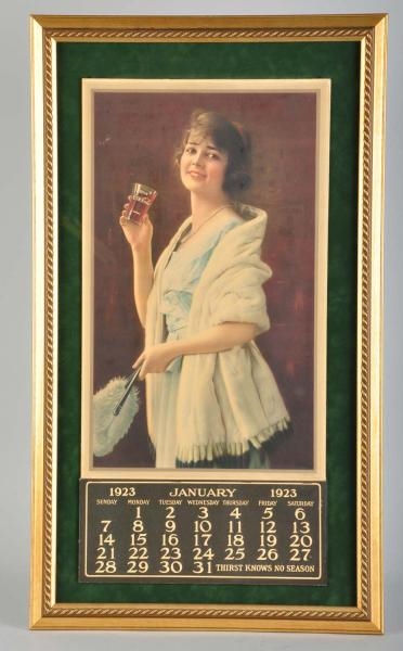 1923 COCA-COLA CALENDAR WITH GLASS FEATURED.      