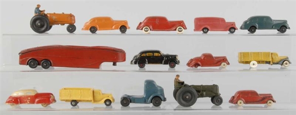 LOT OF 14: AUBURN & OTHER RUBBER VEHICLE TOYS.    