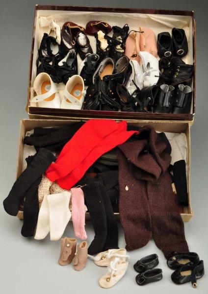 LOT OF DOLL SHOES AND STOCKINGS.                  