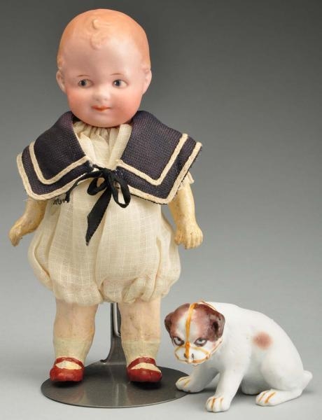 HEUBACH CHARACTER DOLL WITH PUPPY.                