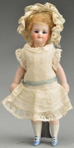 FRENCH ALL BISQUE “MIGNONNETTE” CHILD DOLL.       