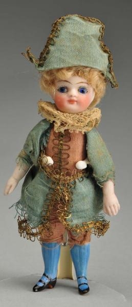 FRENCH ALL-BISQUE “MIGNONNETTE” JESTER DOLL.      