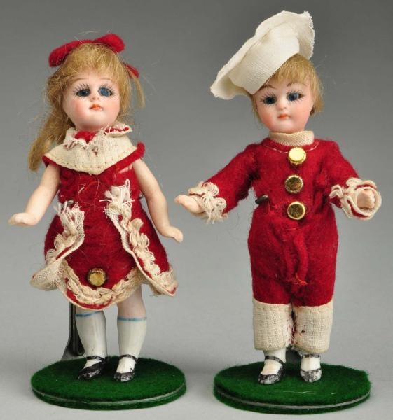 PAIR OF ALL BISQUE TWIN DOLLS.                    