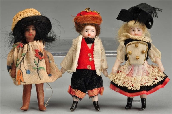LOT OF 3: ALL-BISQUE CHILD DOLLS.                 