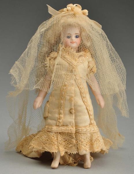 FRENCH ALL BISQUE “MIGNONNETTE” BRIDE WITH BOOTS. 