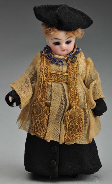 FRENCH ALL BISQUE DOLL IN PRIEST COSTUME.         