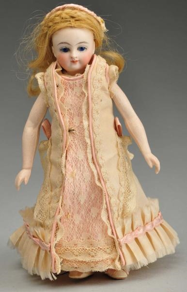 FRENCH BISQUE "MIGNONNETTE" DOLL WITH BARE FEET.  