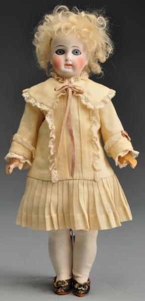 EARLY GERMAN PALE BISQUE DOLL.                    