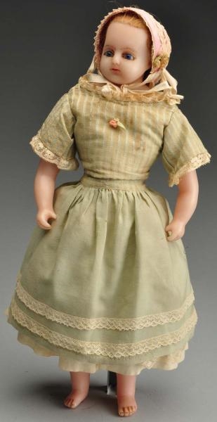 ENGLISH POURED WAX CHILD DOLL.                    