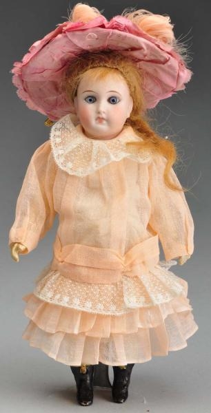 EARLY GERMAN DOLL WITH CLOSED MOUTH.              